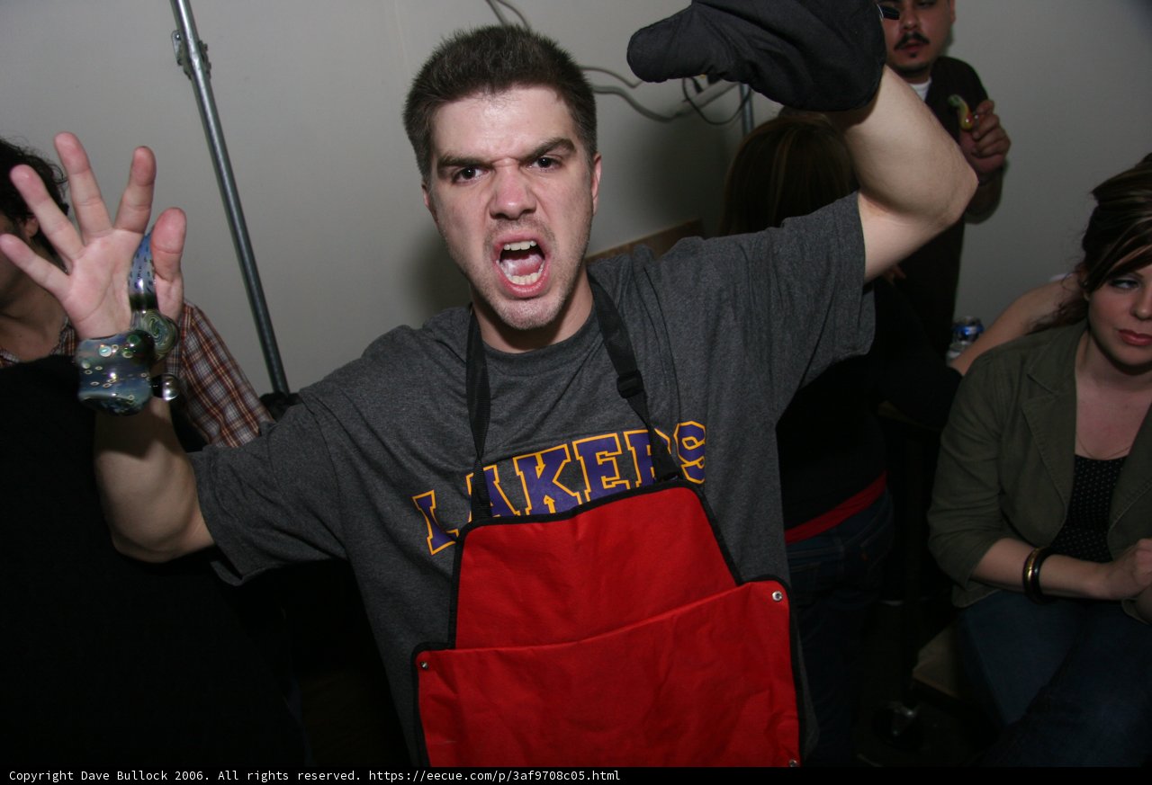 Apron-wearing Man in the Kitchen