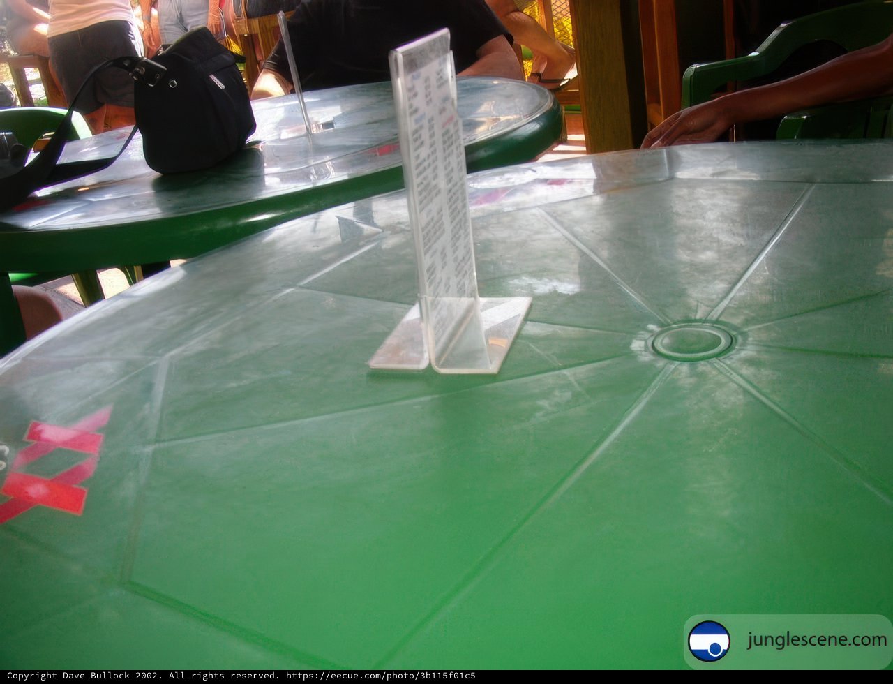 Green Dining Table with Sign