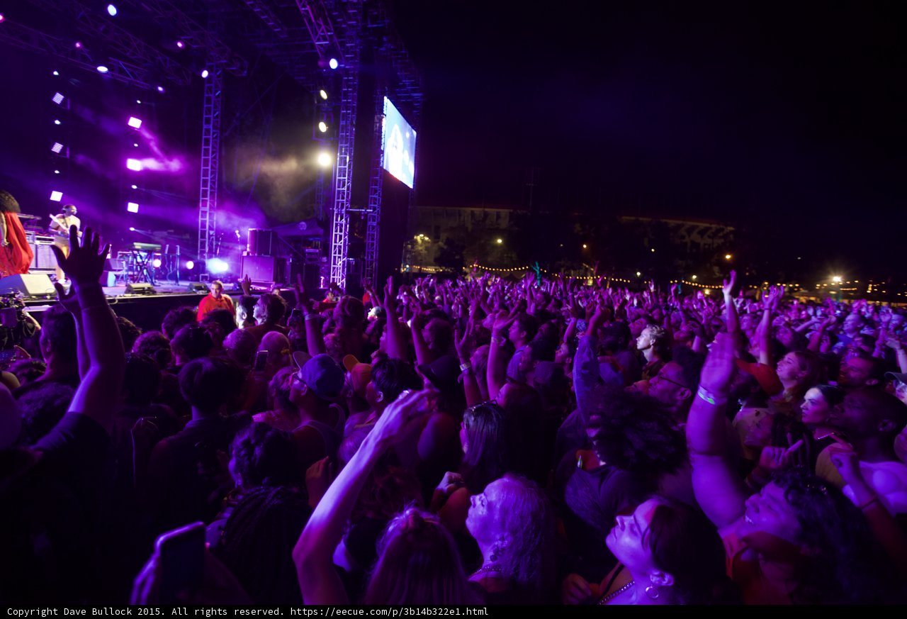 FYF Fest Wide Crowd Shot Solange Stage Arms Raised Video Screen String Lights Purple