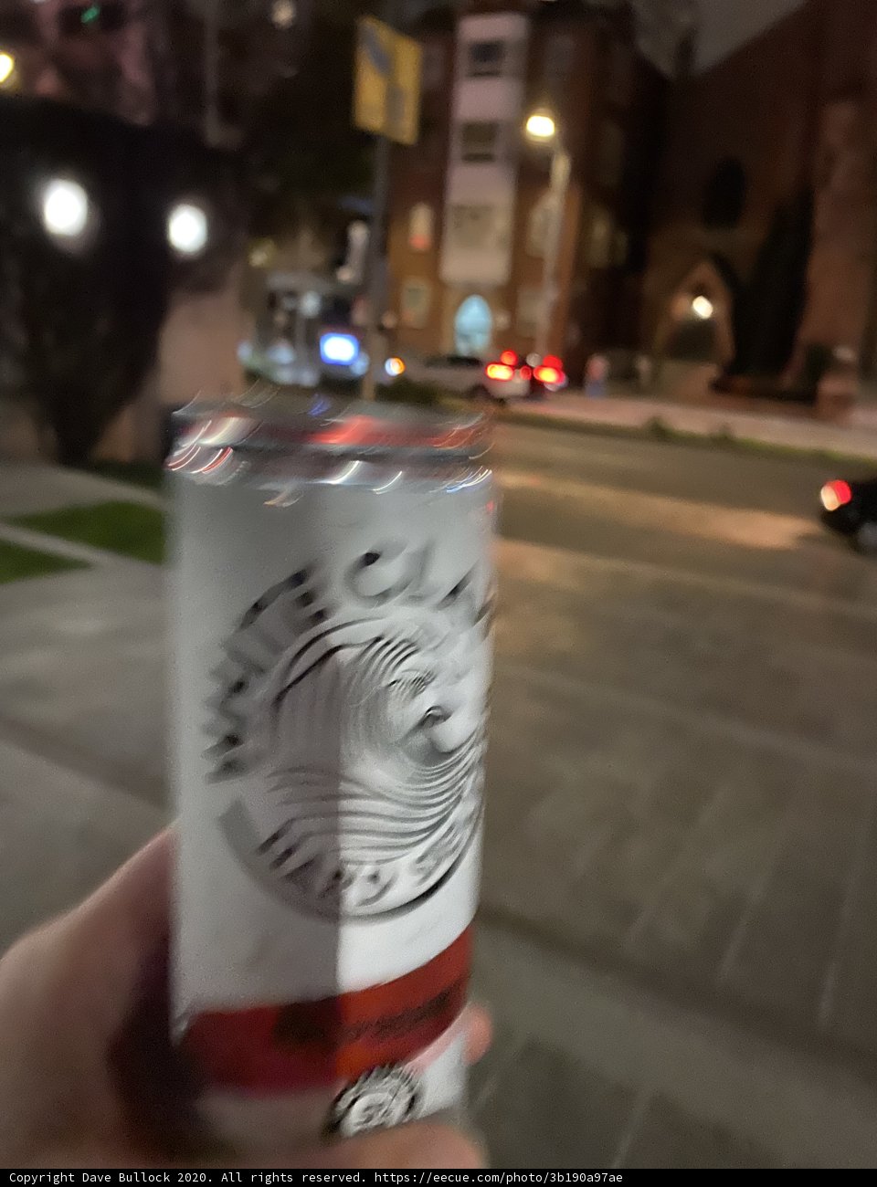 Enjoying a Tin of Beer on the Street