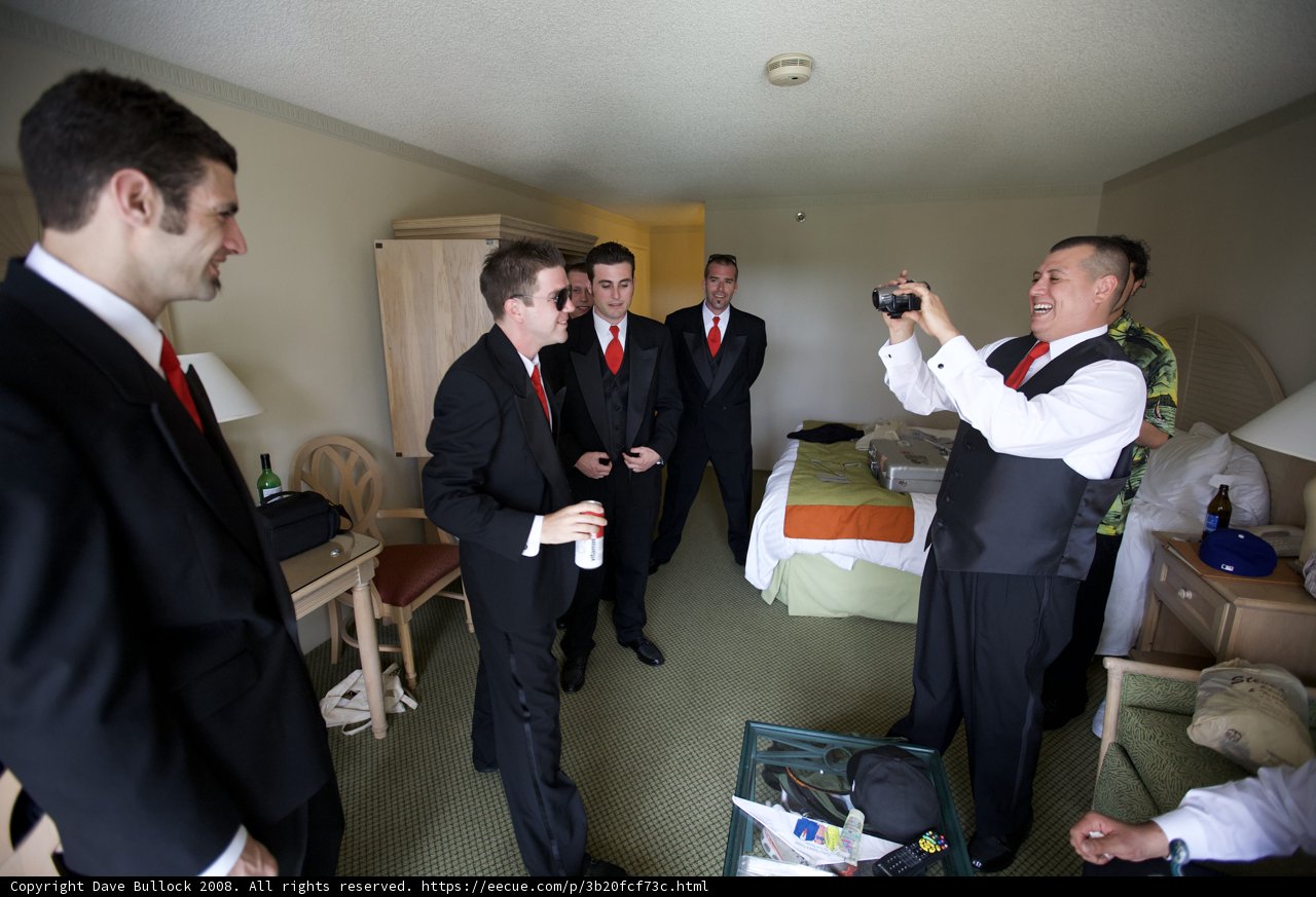 Men in Suits Pose for a Photo