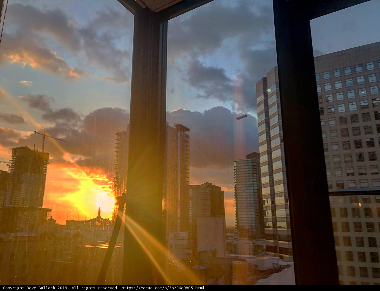 Urban Sunset Through a Window