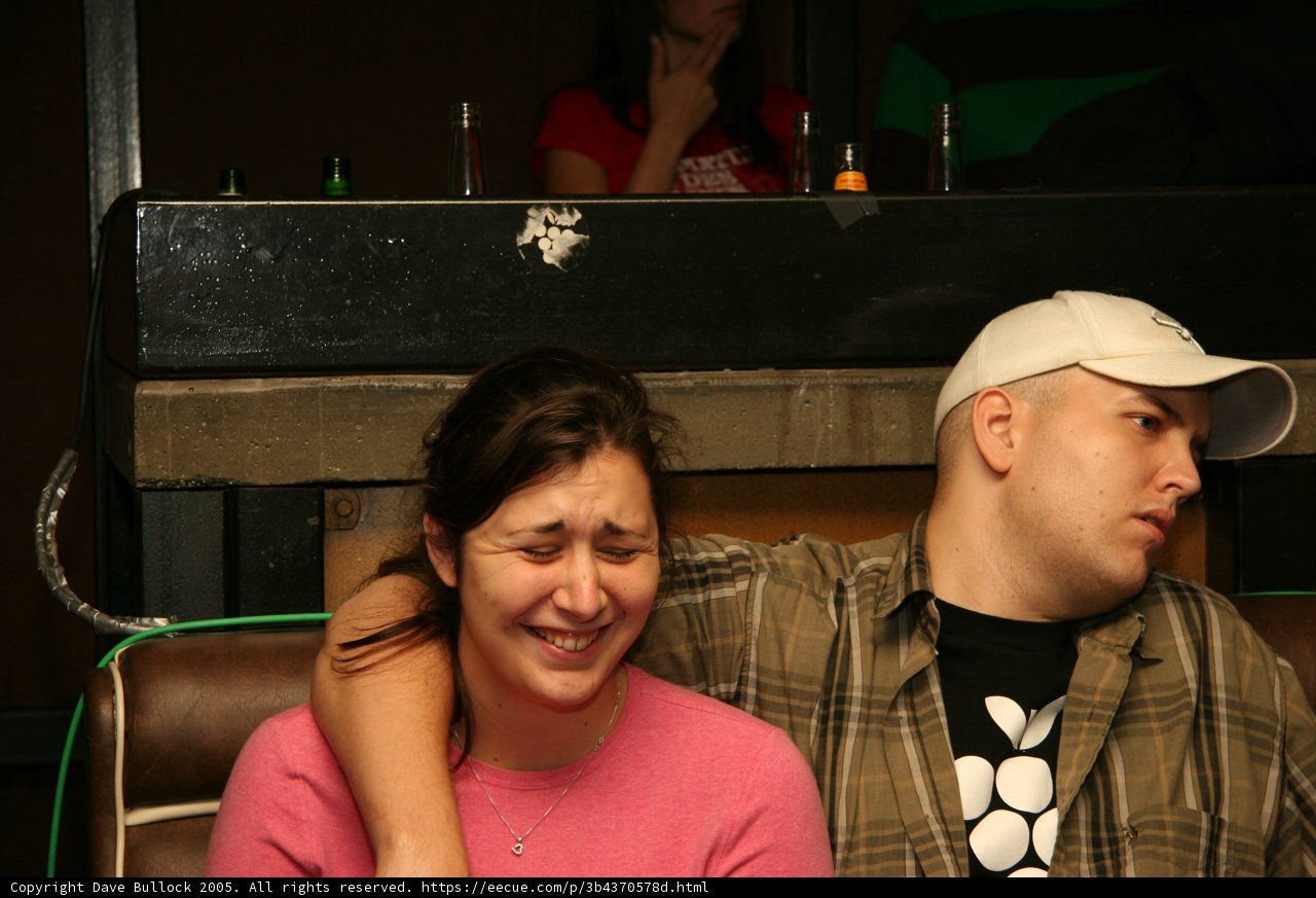 Pink Shirt and Baseball Hat at the Pub