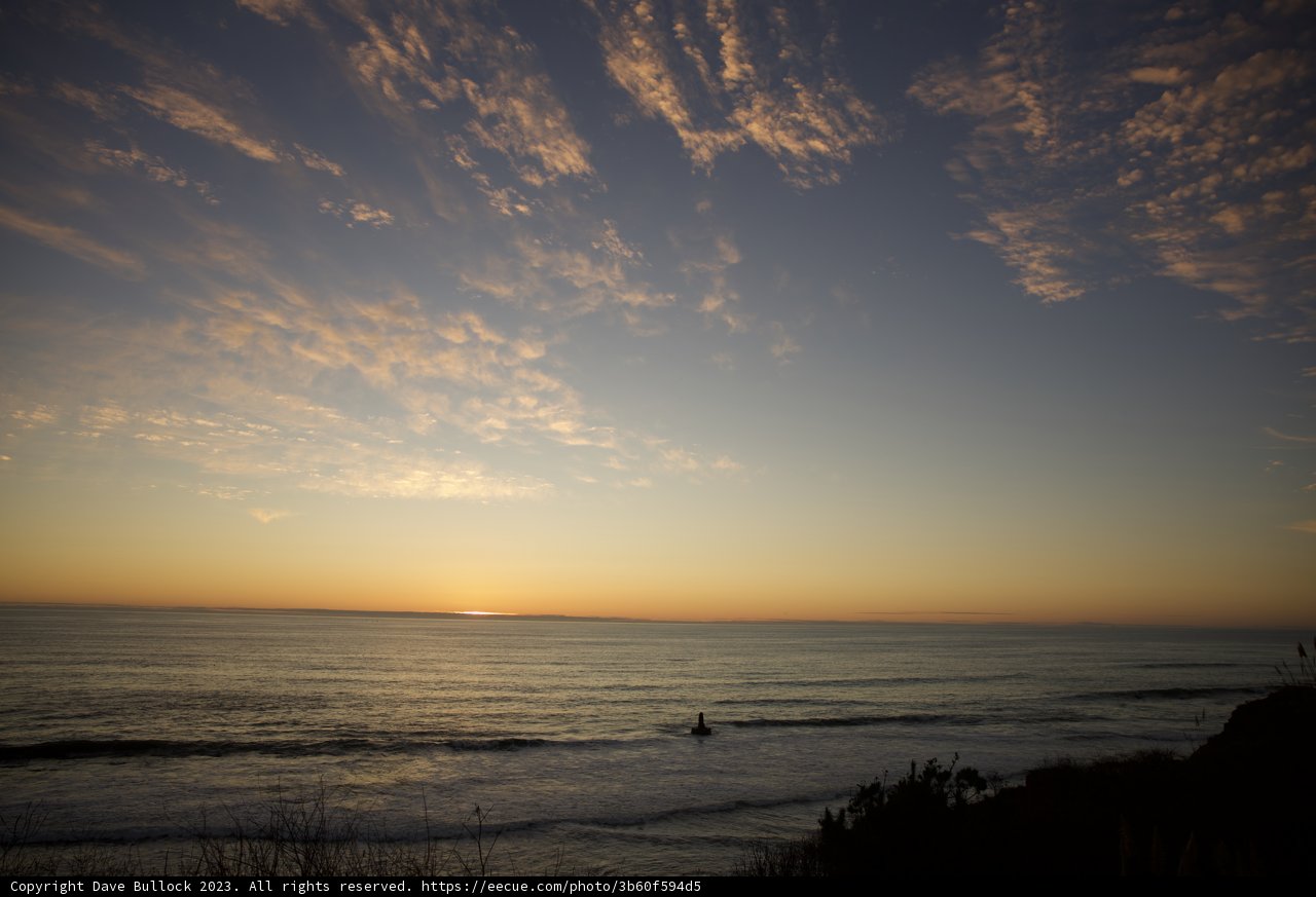 The Solitary Surfer at Sunset