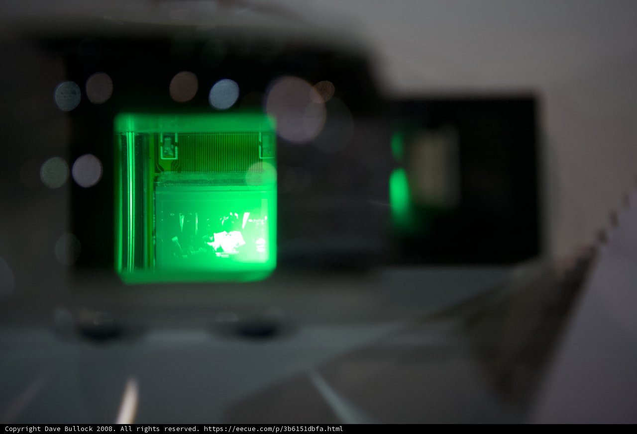 Green Light Shining Through Glass Window