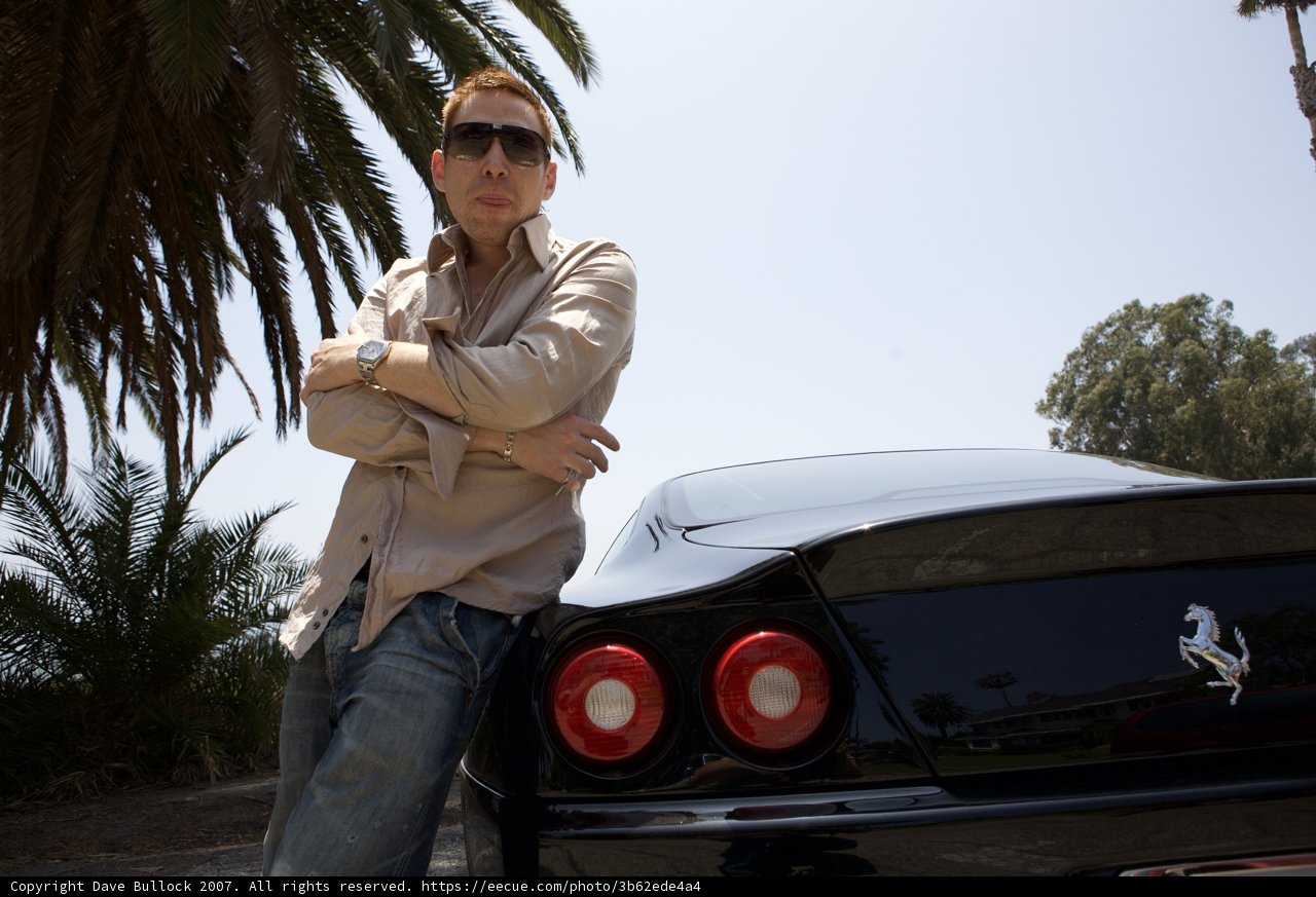 Man and Machine: Posing with a Ferrari
