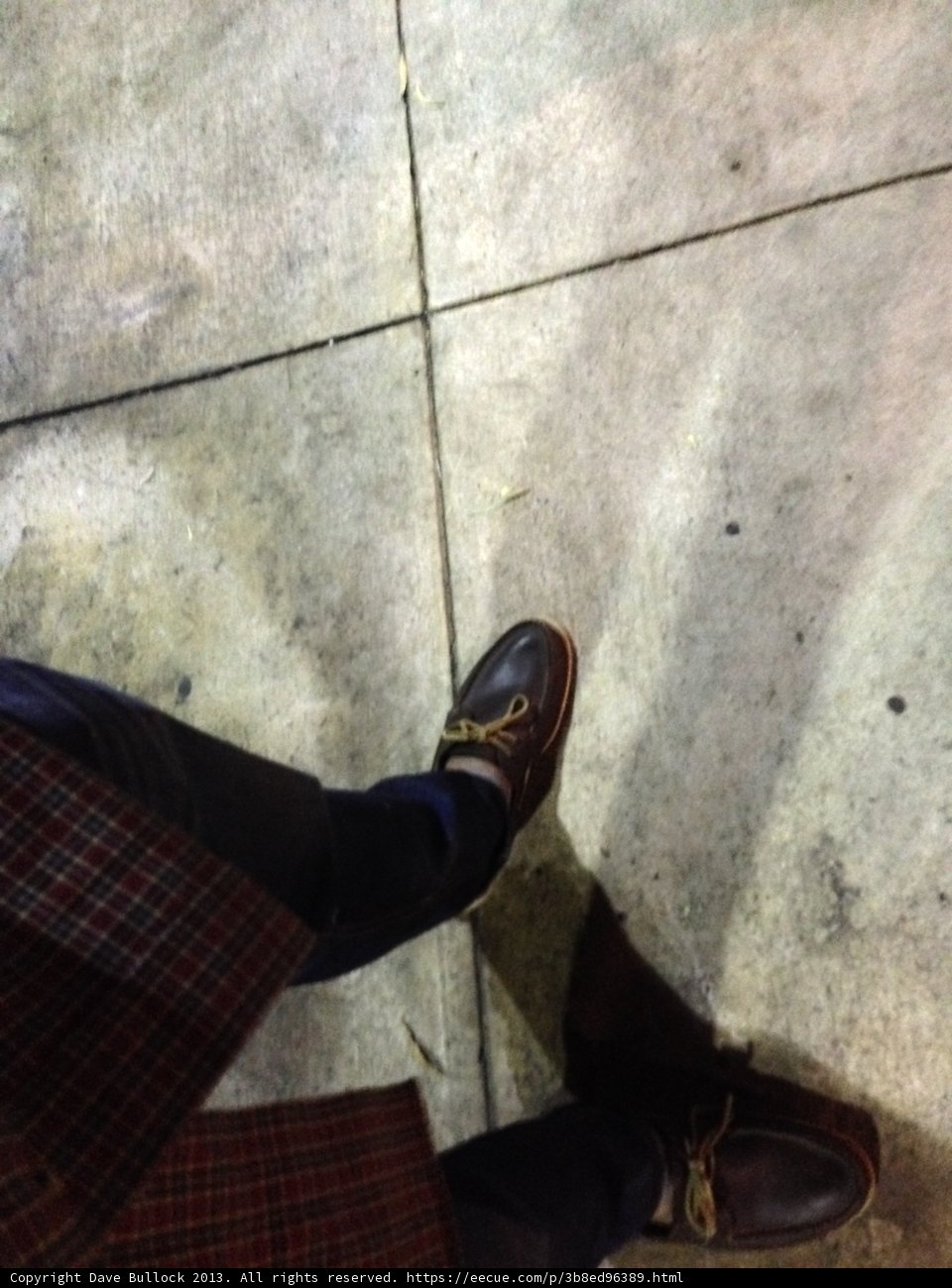 Tartan Shoes on a Sidewalk