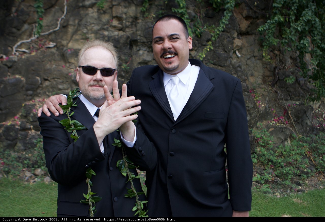 Two Men in Suits Strike a Pose