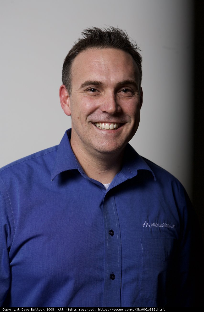 Happy Man in a Blue Dress Shirt