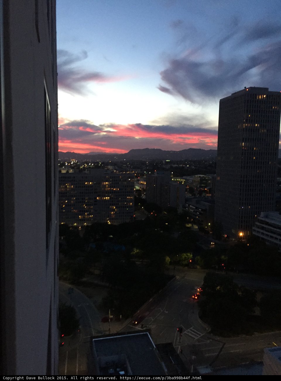 Pink Clouds Over Hills
