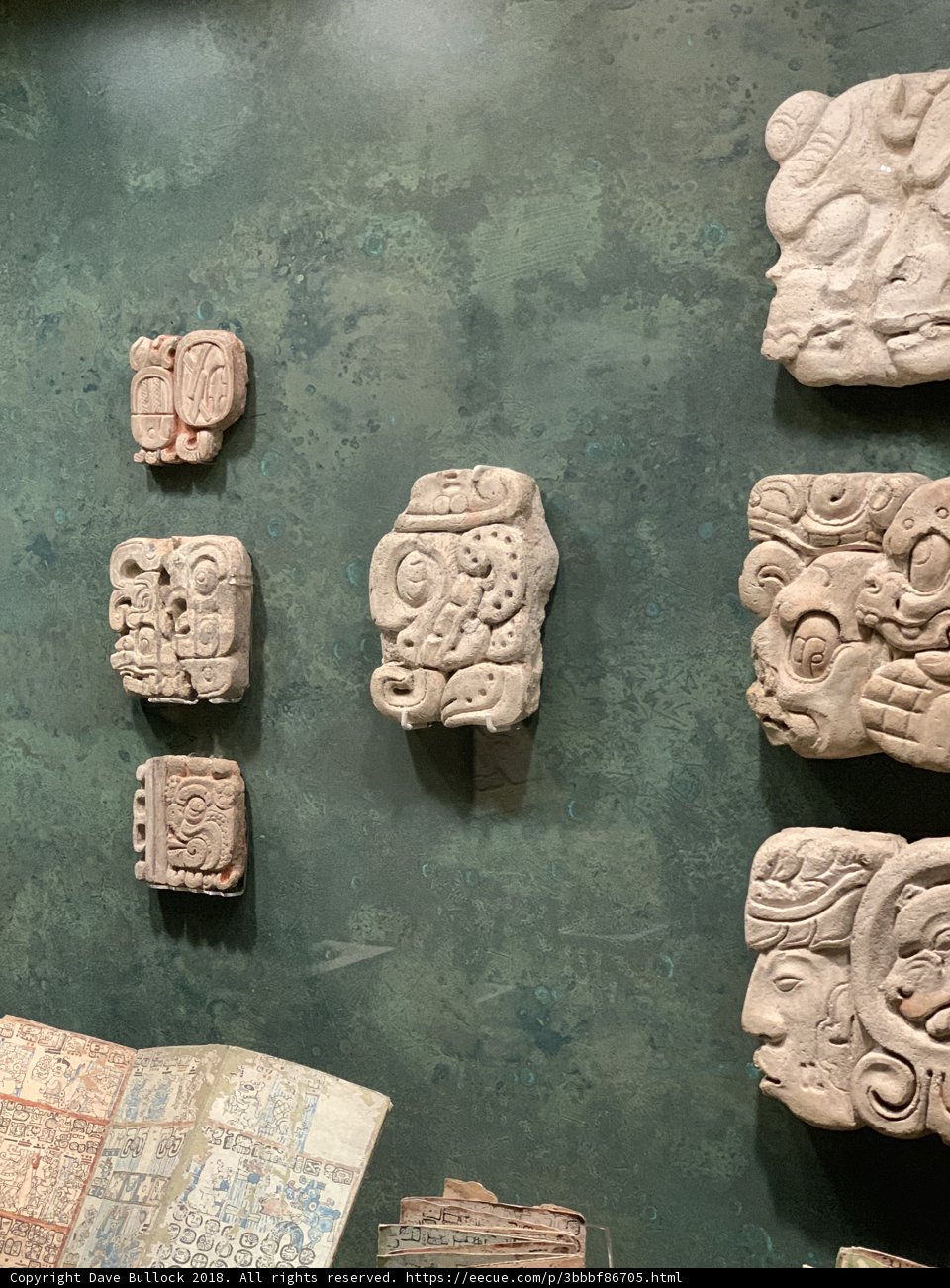 Ancient Emblems and Symbols on Stone Wall