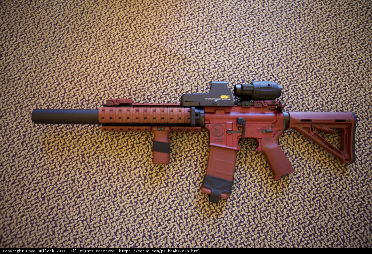 Red Firearm Ready to Strike
