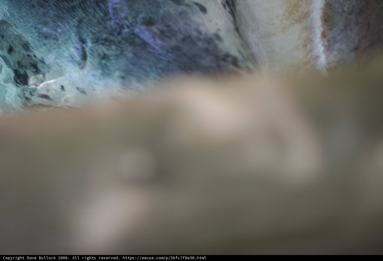 Close-up of a Rock with Blue and Green Background