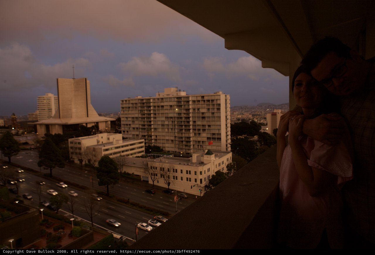 Newlyweds on Balcony at San Francisco Dusk