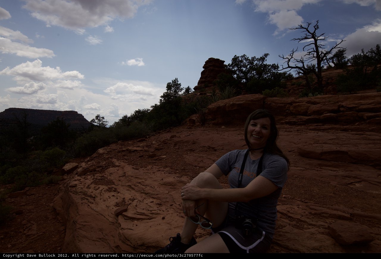 Hiker Resting on Red Rock Formations in Sedona