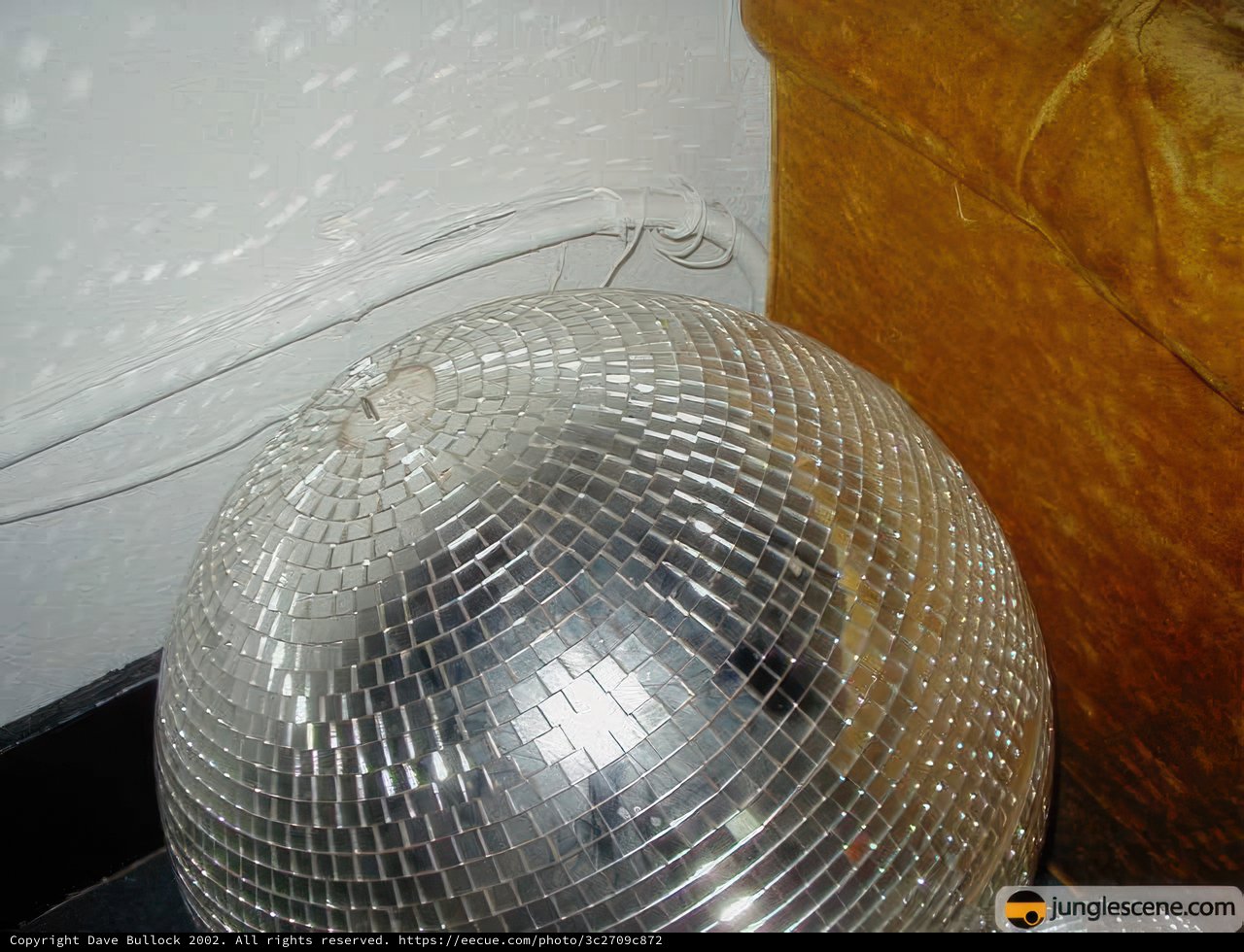 Silver Disco Ball Shining on the Floor