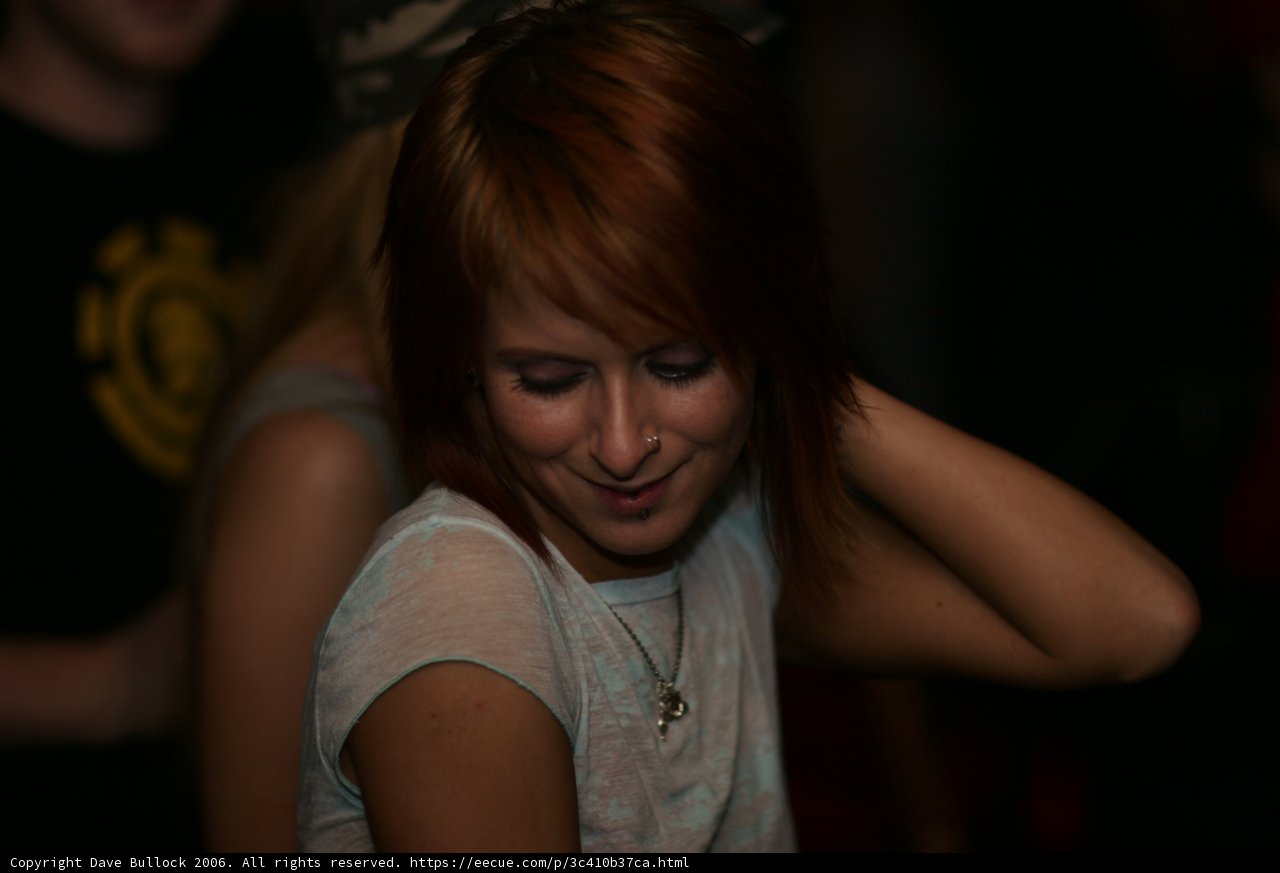 Red-haired Woman with a Bold Necklace