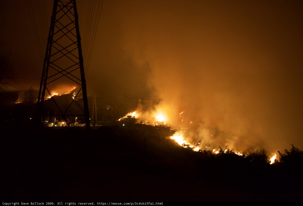 Flames Flicker Near Electrical Lines