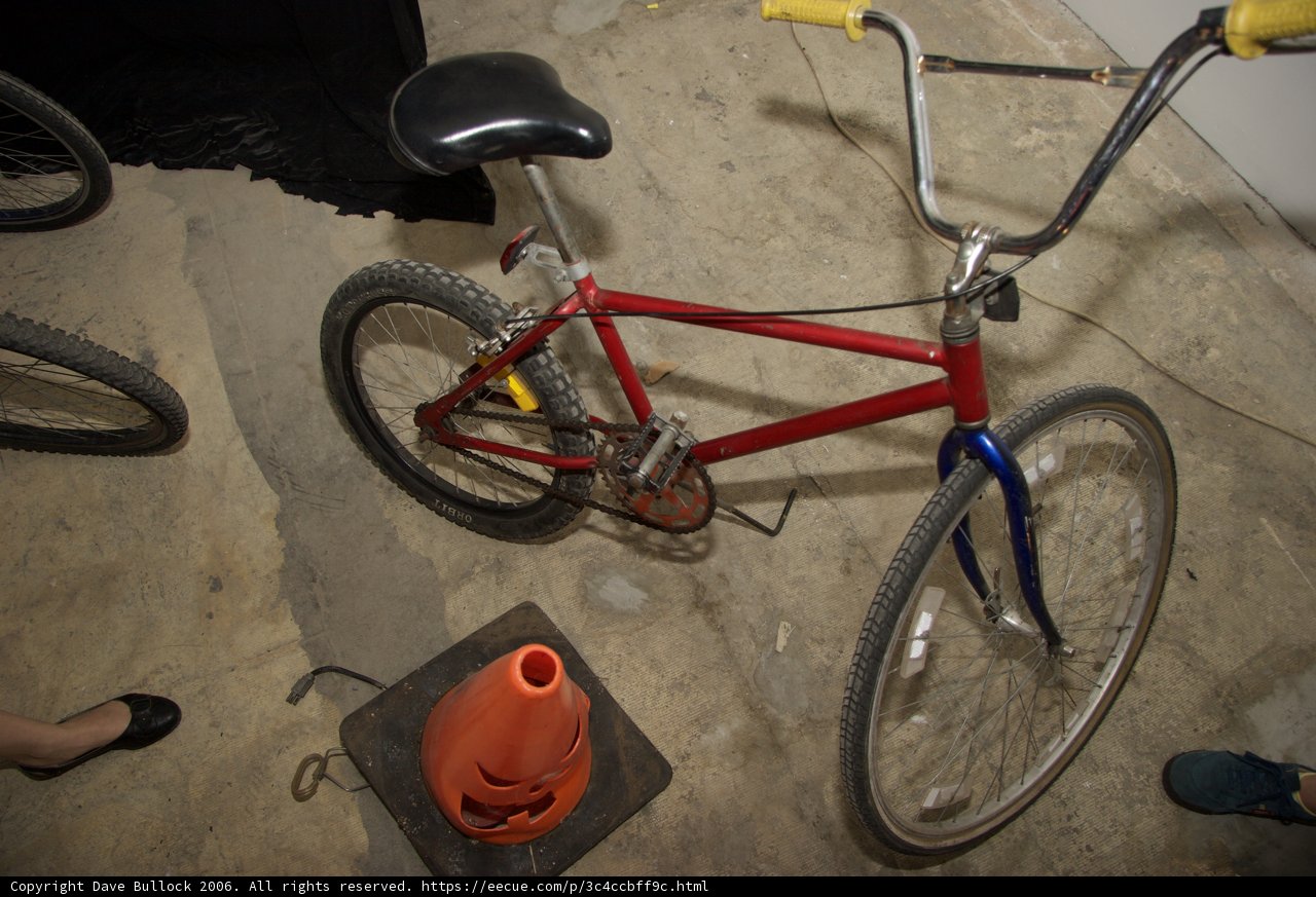 Red and Blue BMX Bike on the Beach