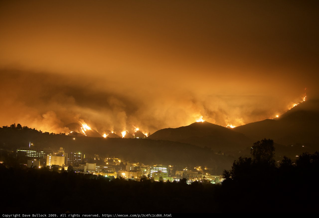 Flames Engulf Hills Above City