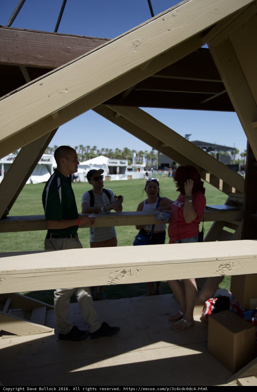 Gathering under Wooden Pergola