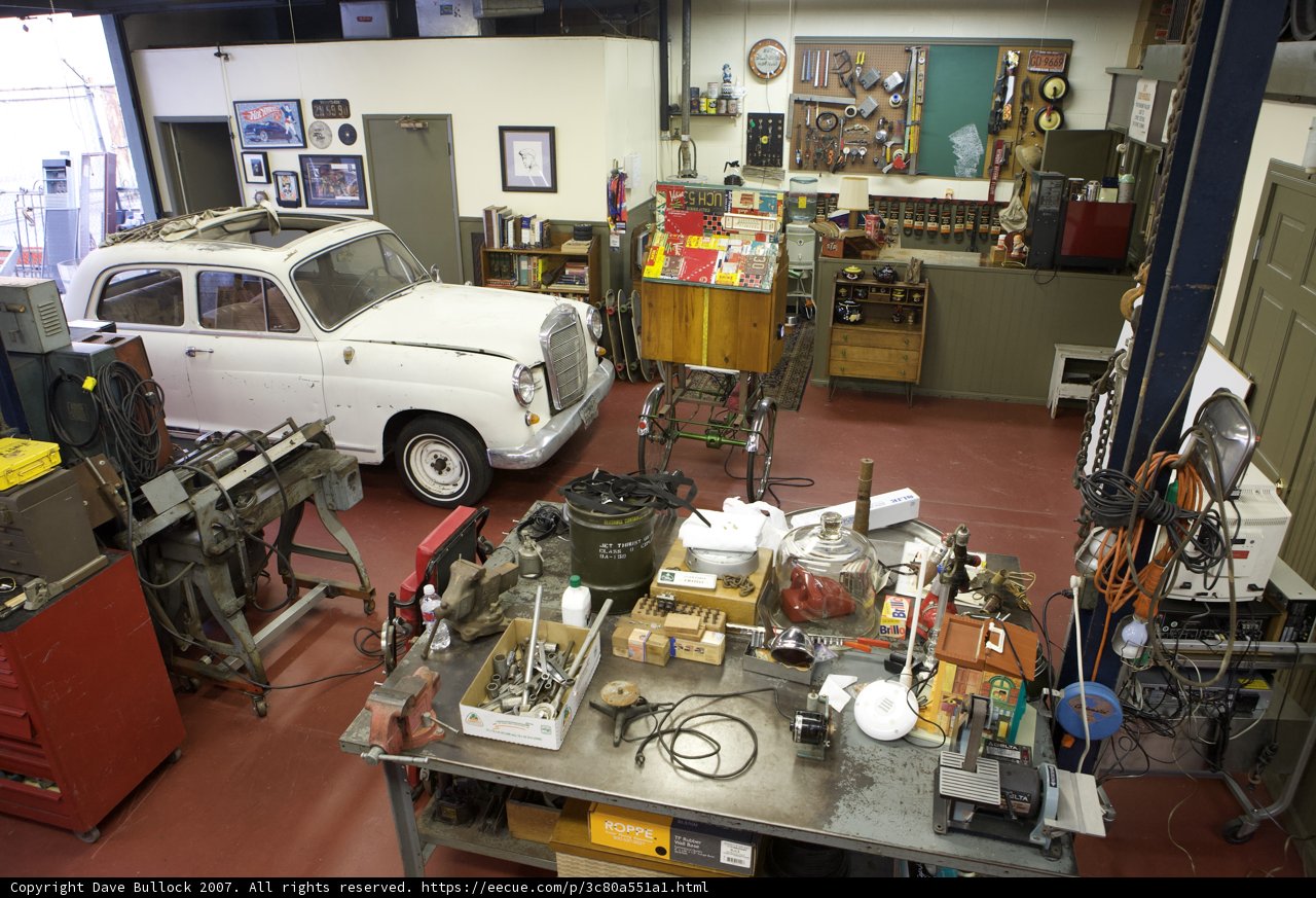 Vintage Car in Industrial Workshop