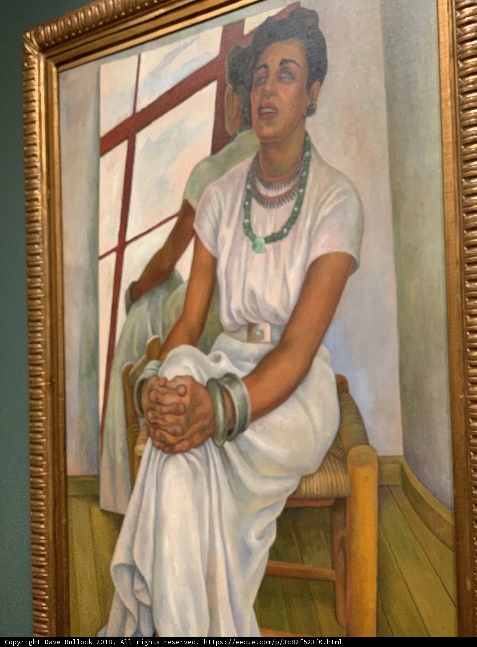 Lady in Wooded Chair