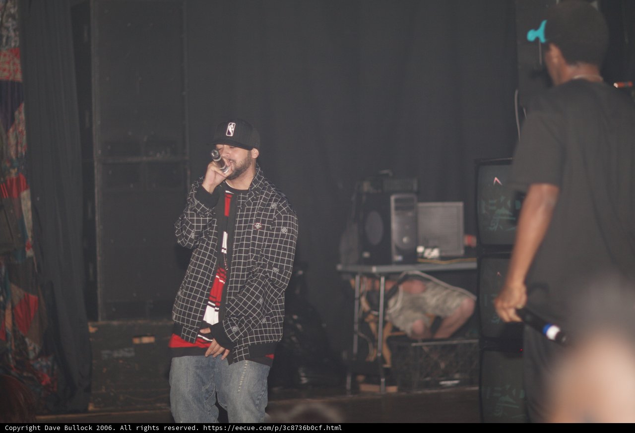 Performer in Red Hat Commands the Stage