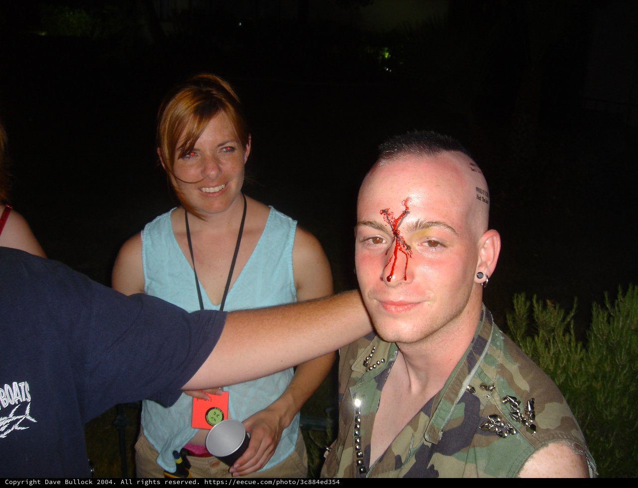 Punk Festival Goer with Theatrical Bloody Makeup