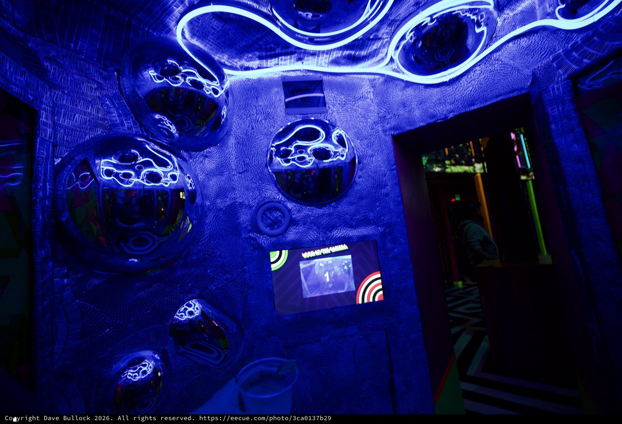 Immersive Blue UV Light Installation in Interactive Art Space