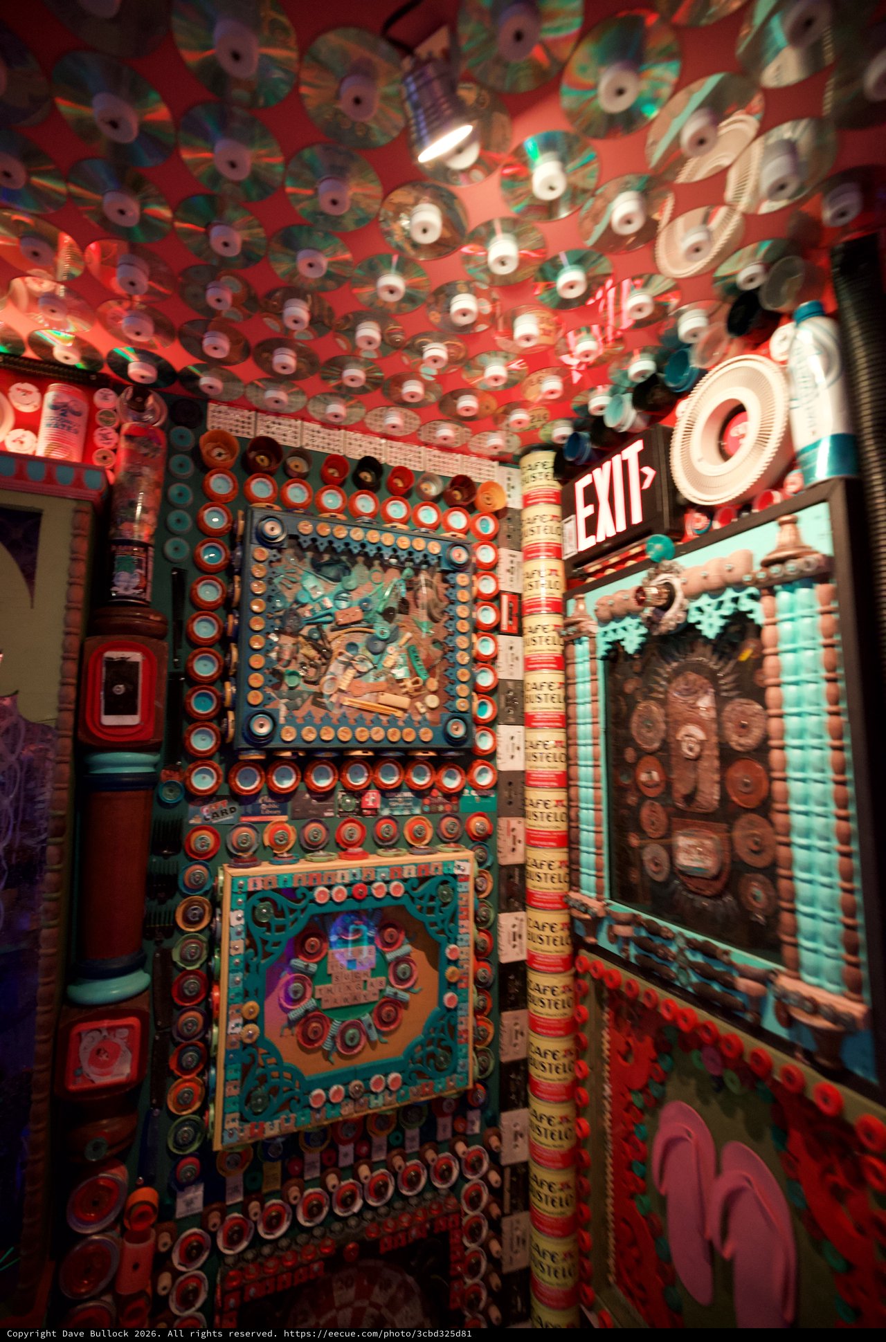 Immersive Found Object Art Installation with CDs and Vintage Materials