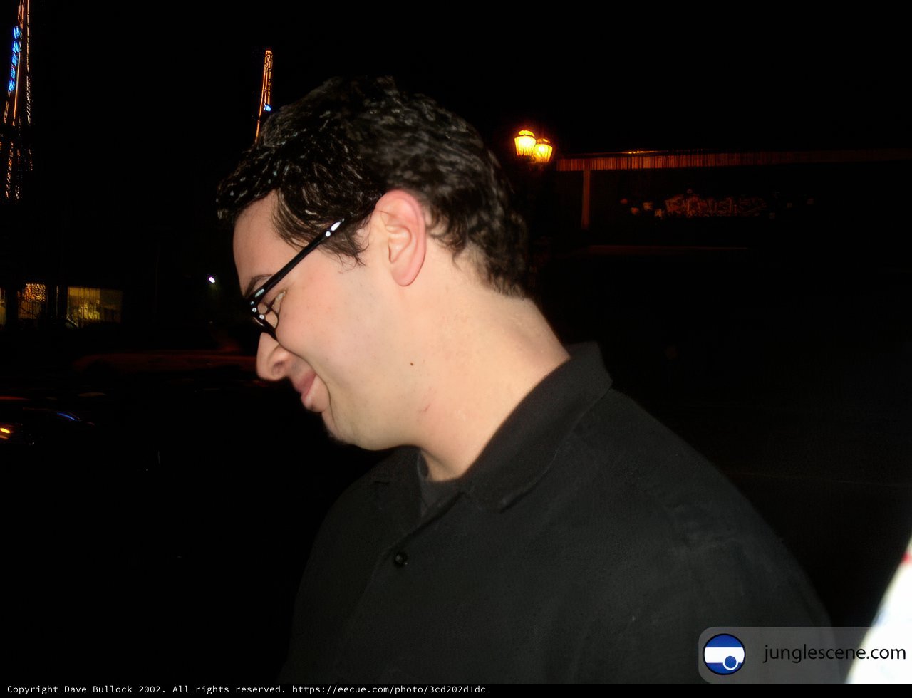 Nighttime Portrait of a Bespectacled Man
