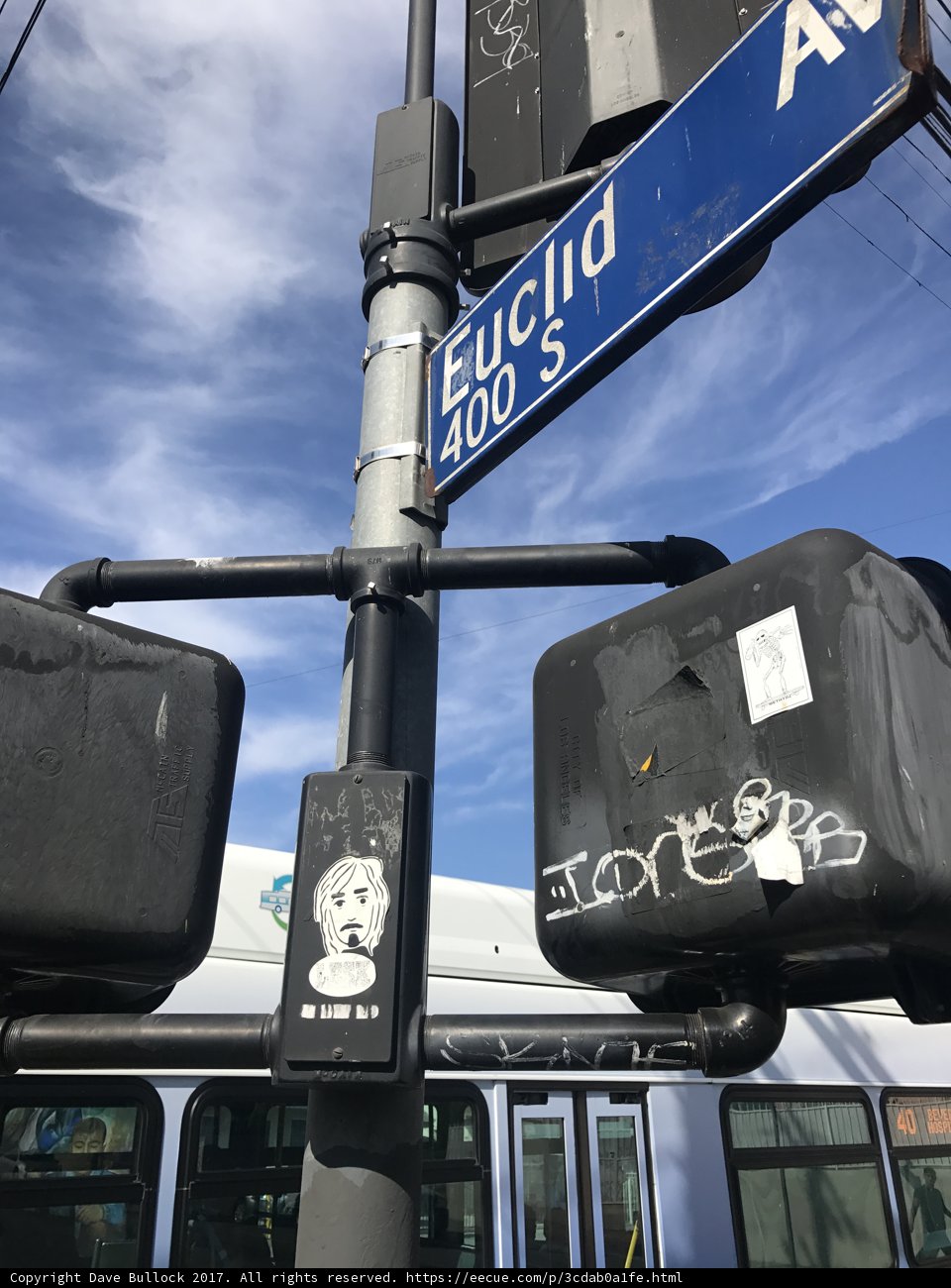 Stickered Sign on Sunny LA Street
