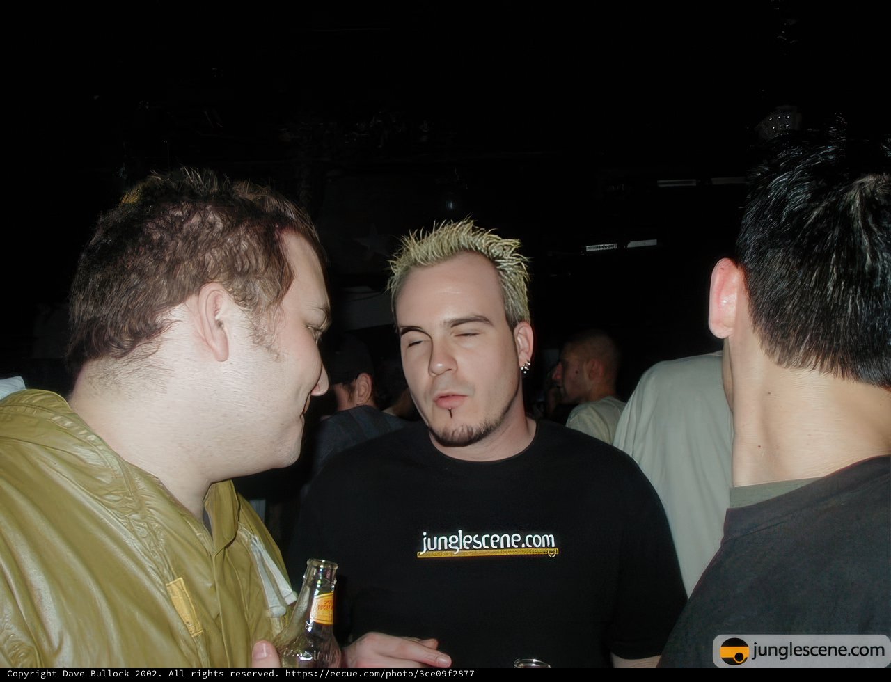 Mohawk Man in Black Shirt at Nightclub