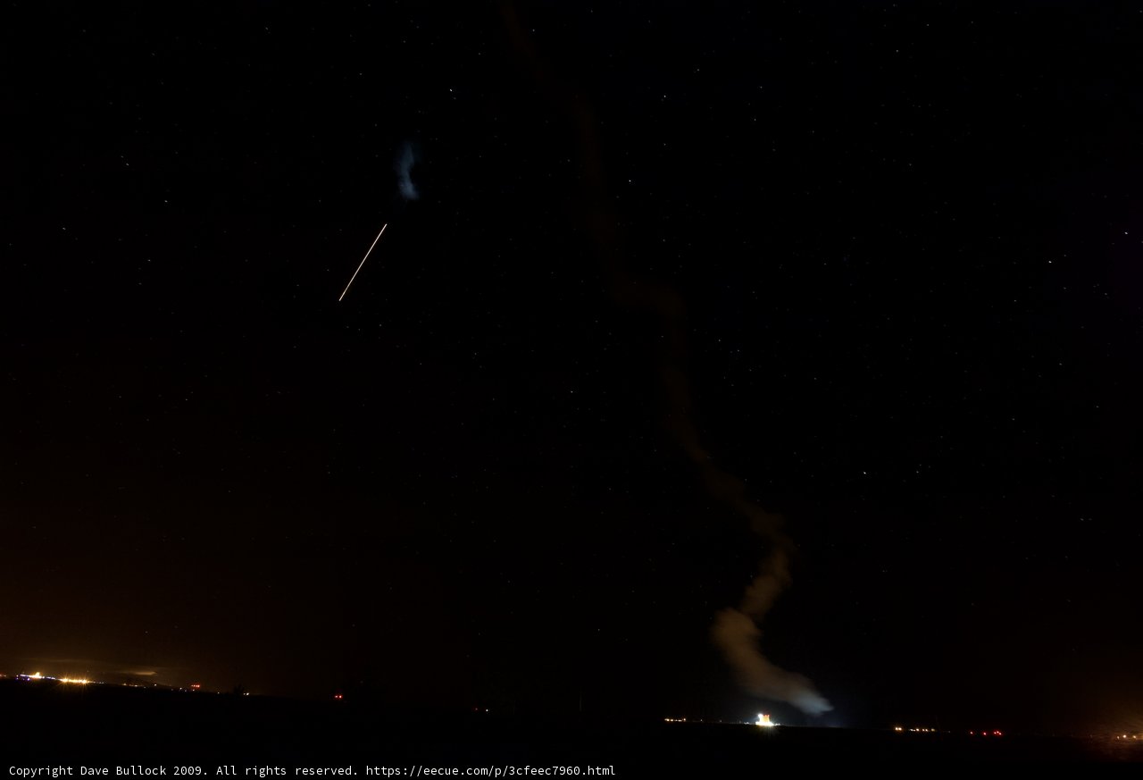 Rocket Launch Under a Starry Night Sky