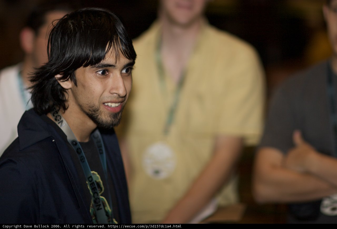 Long-haired Man in a Crowd
