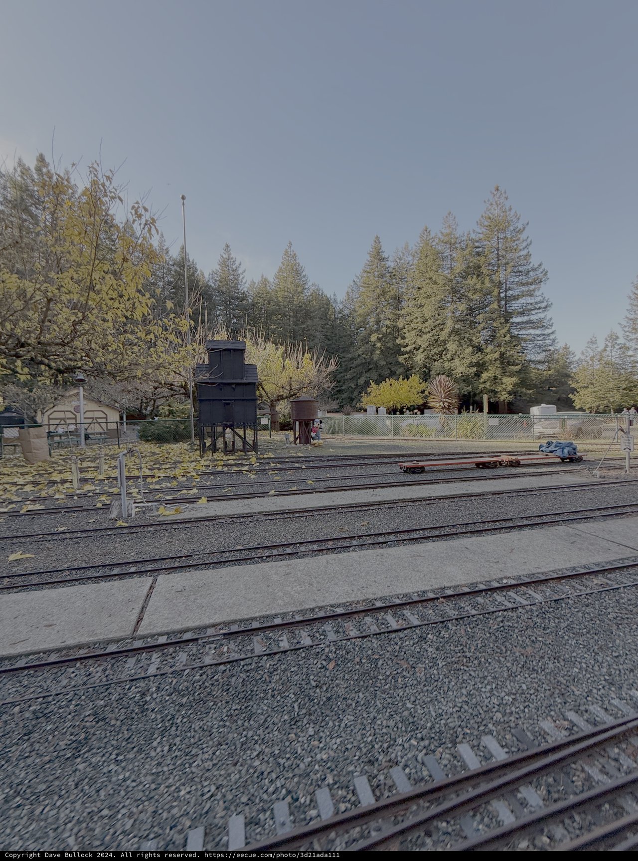 Quiet Railway Junction with Historic Water Tower