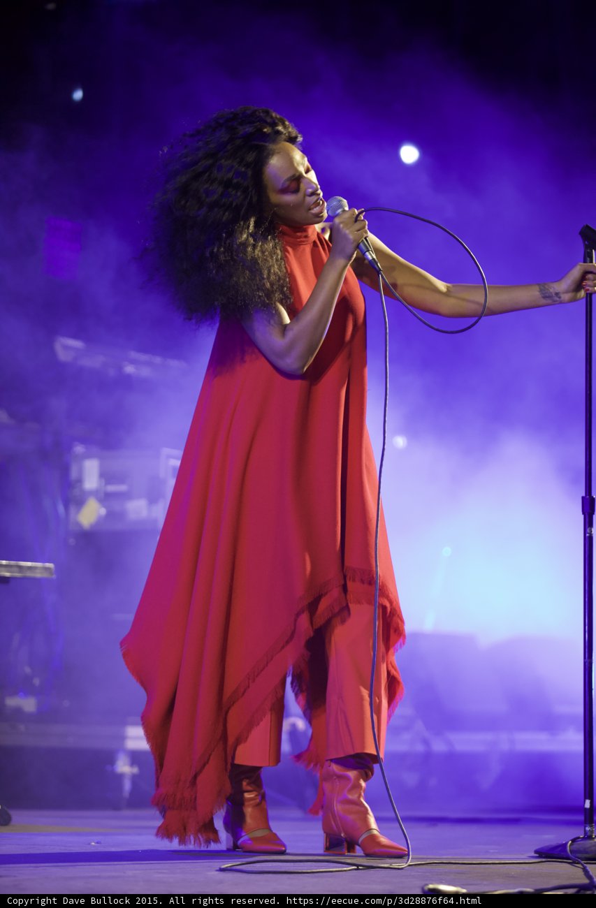 Solange Eyes Closed Singing Mic Stand Cord Loop Purple