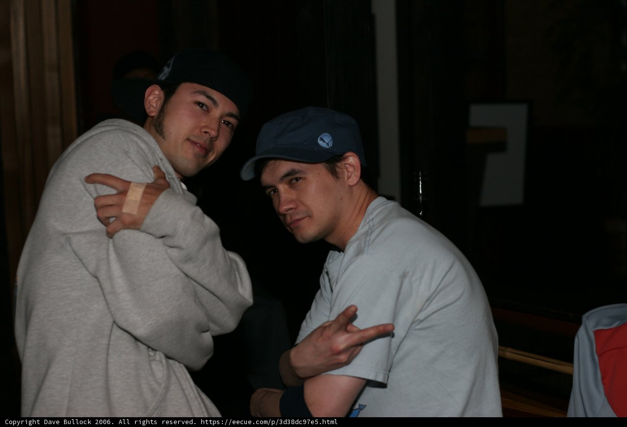 Two Men Strike a Pose