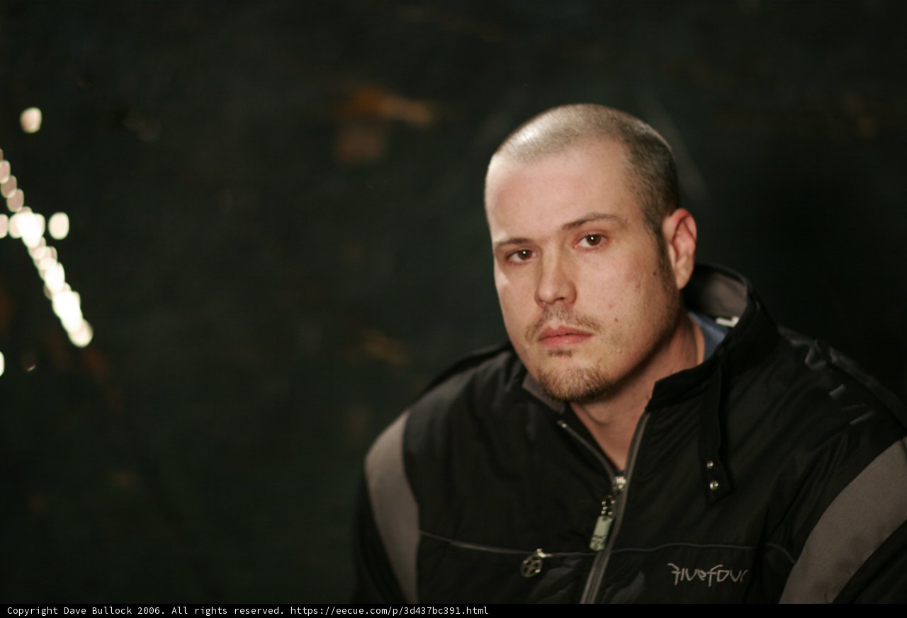 Shaved Head and Black Jacket