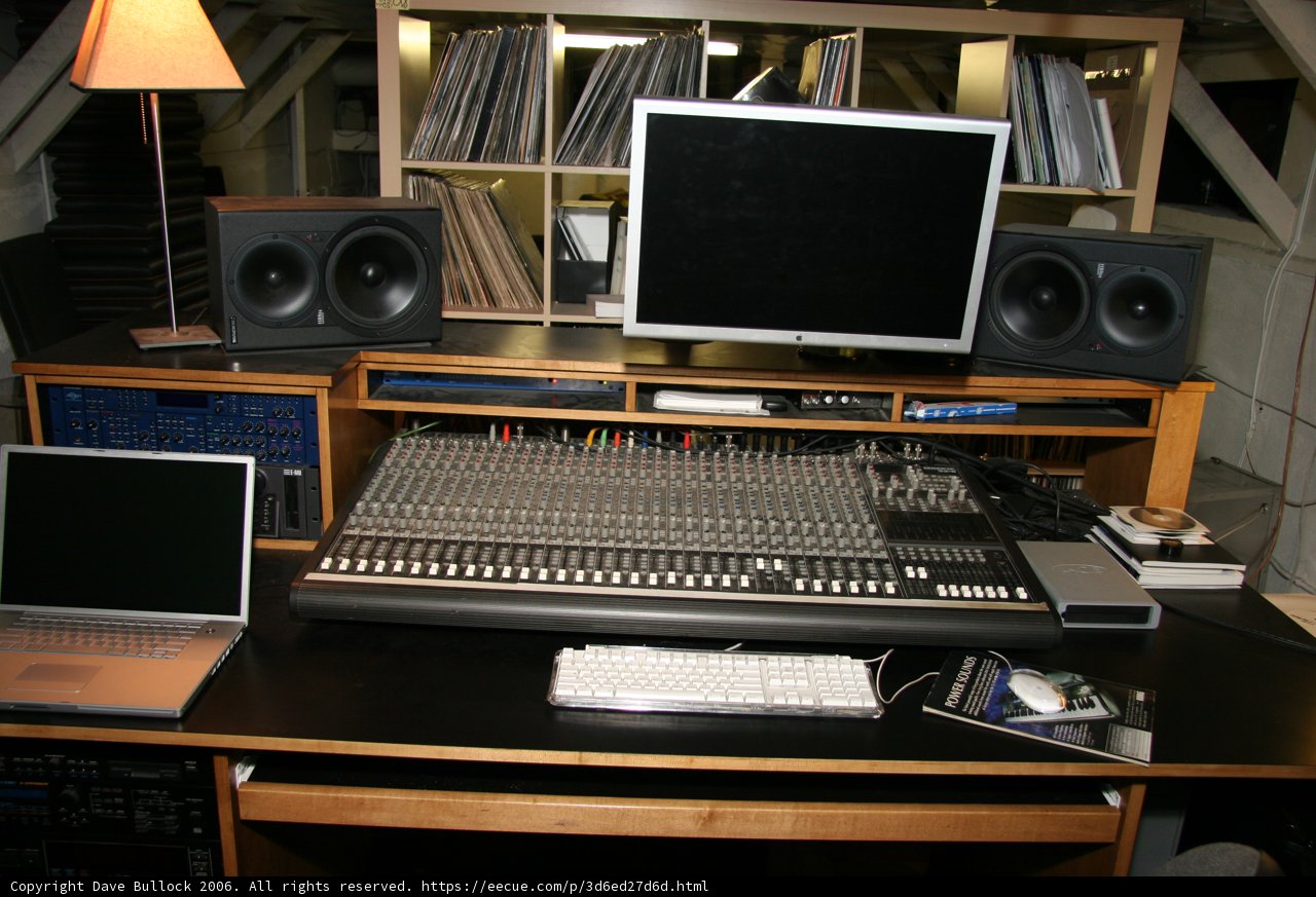 Black Desk with Computer and Speakers