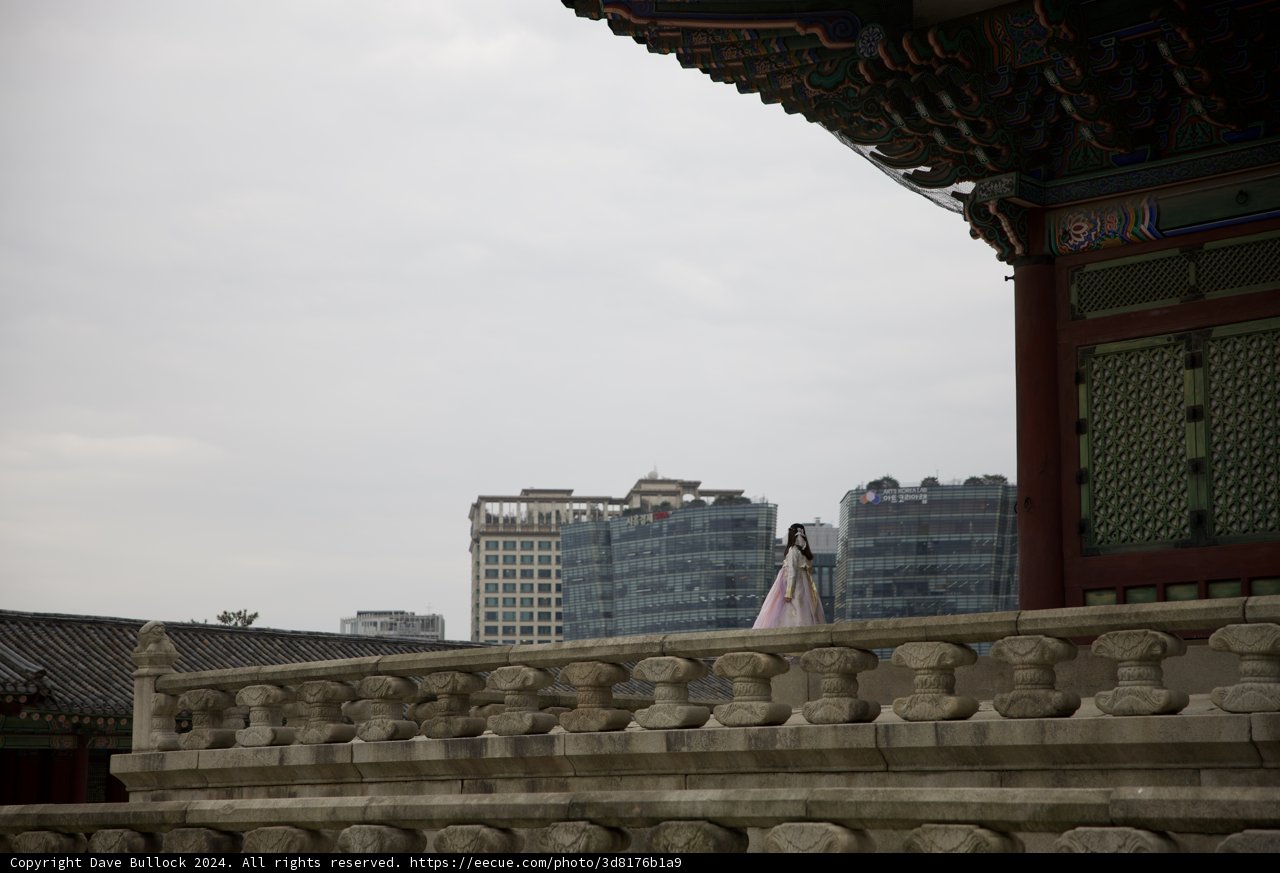 Architectural Echoes: A Moment of Solitude on the Balcony
