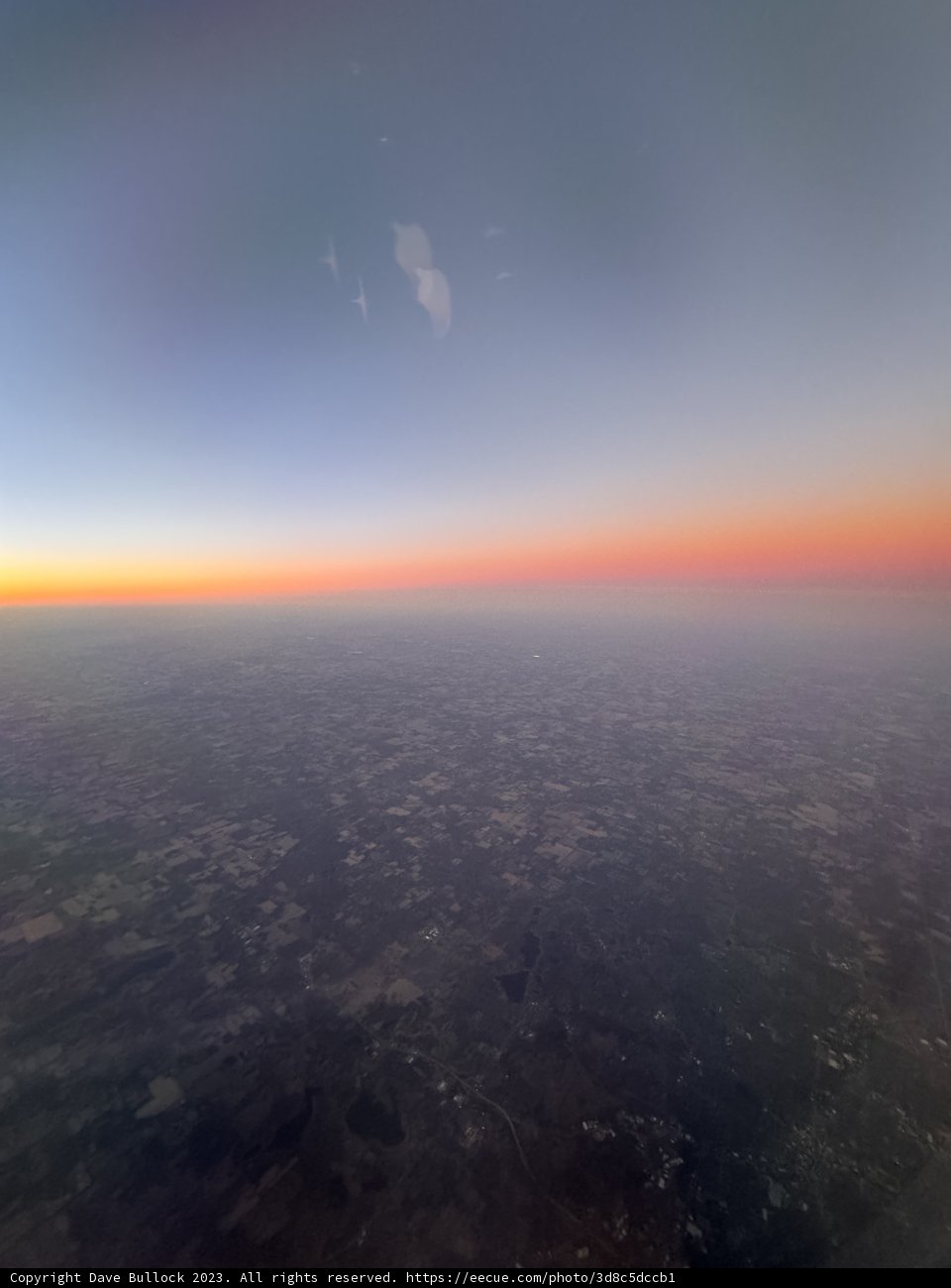 Sunrise Soaring: Aerial View of the Sun Above the Ocean