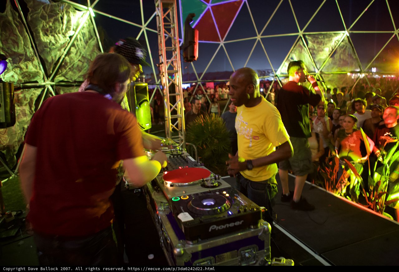 Two Men Grooving to the Beats