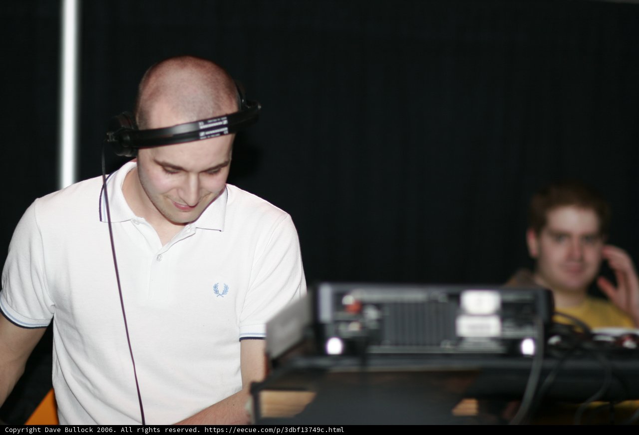 DJ Jamming Out in White Shirt