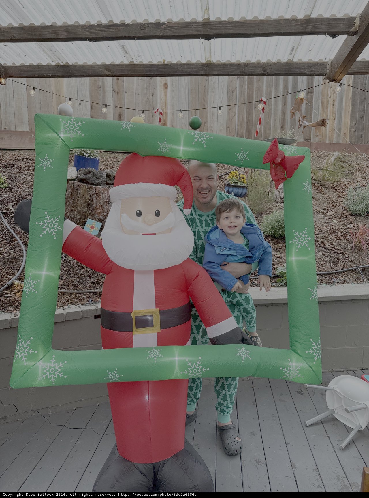 Christmas Morning Family Photo with Inflatable Santa