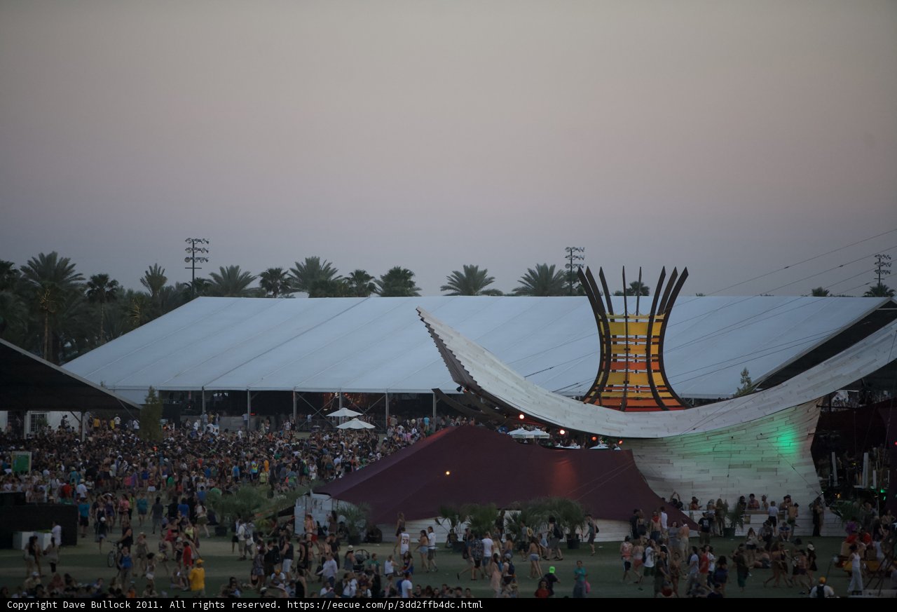 Concertgoers gather around large tent at Coachella Festival