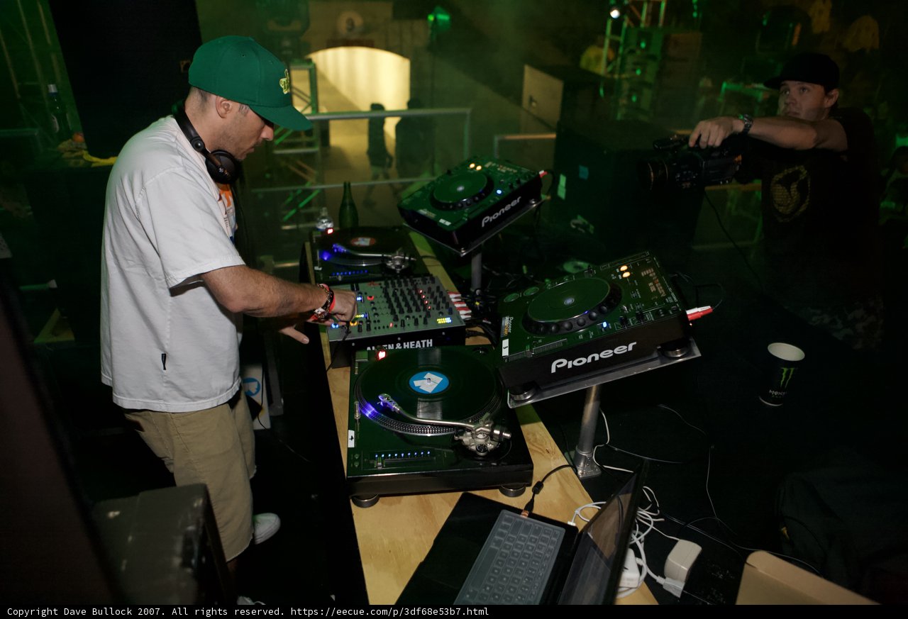 Green Hat DJ Table Performance