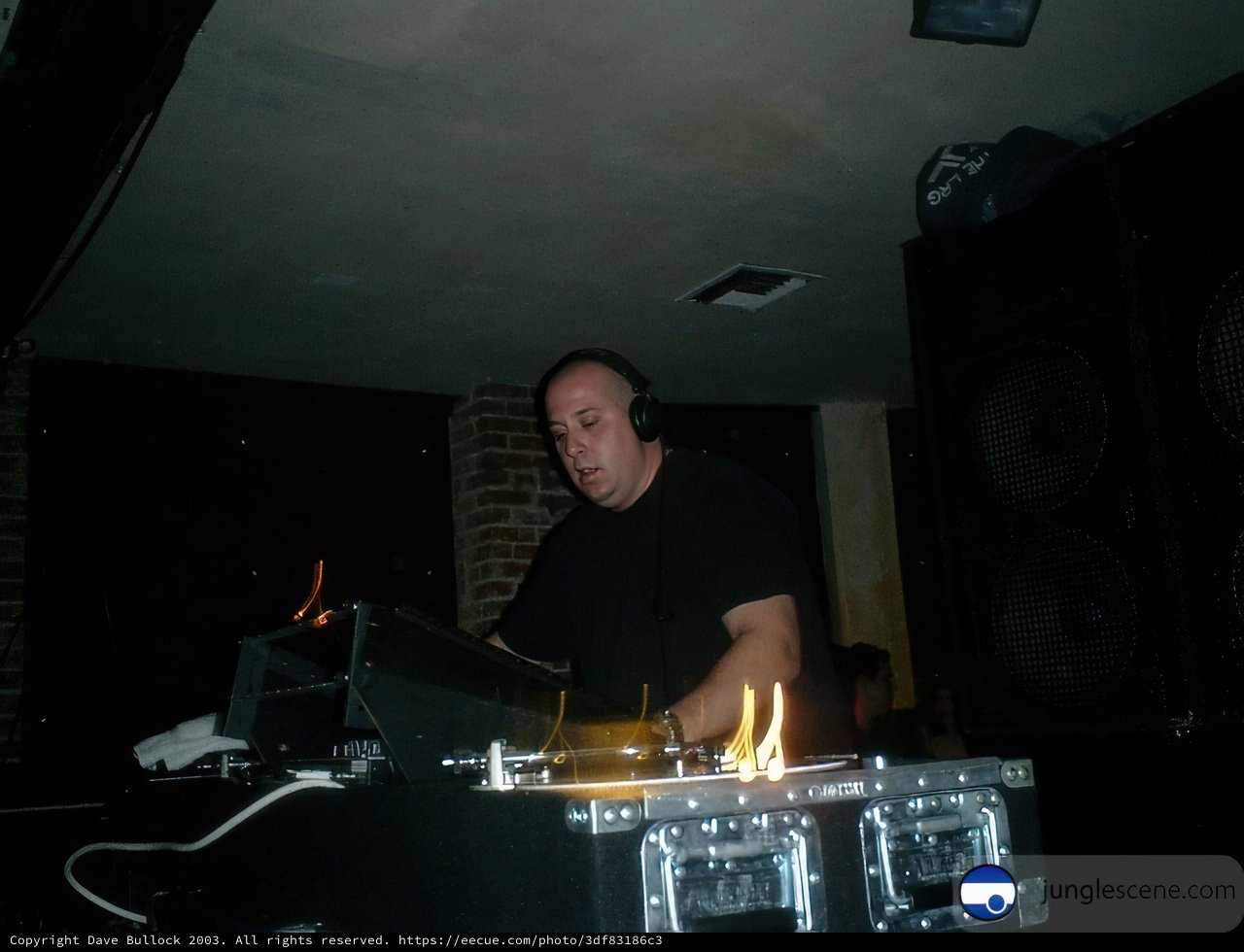 AK1200 Spinning Tracks on the DJ Mixer