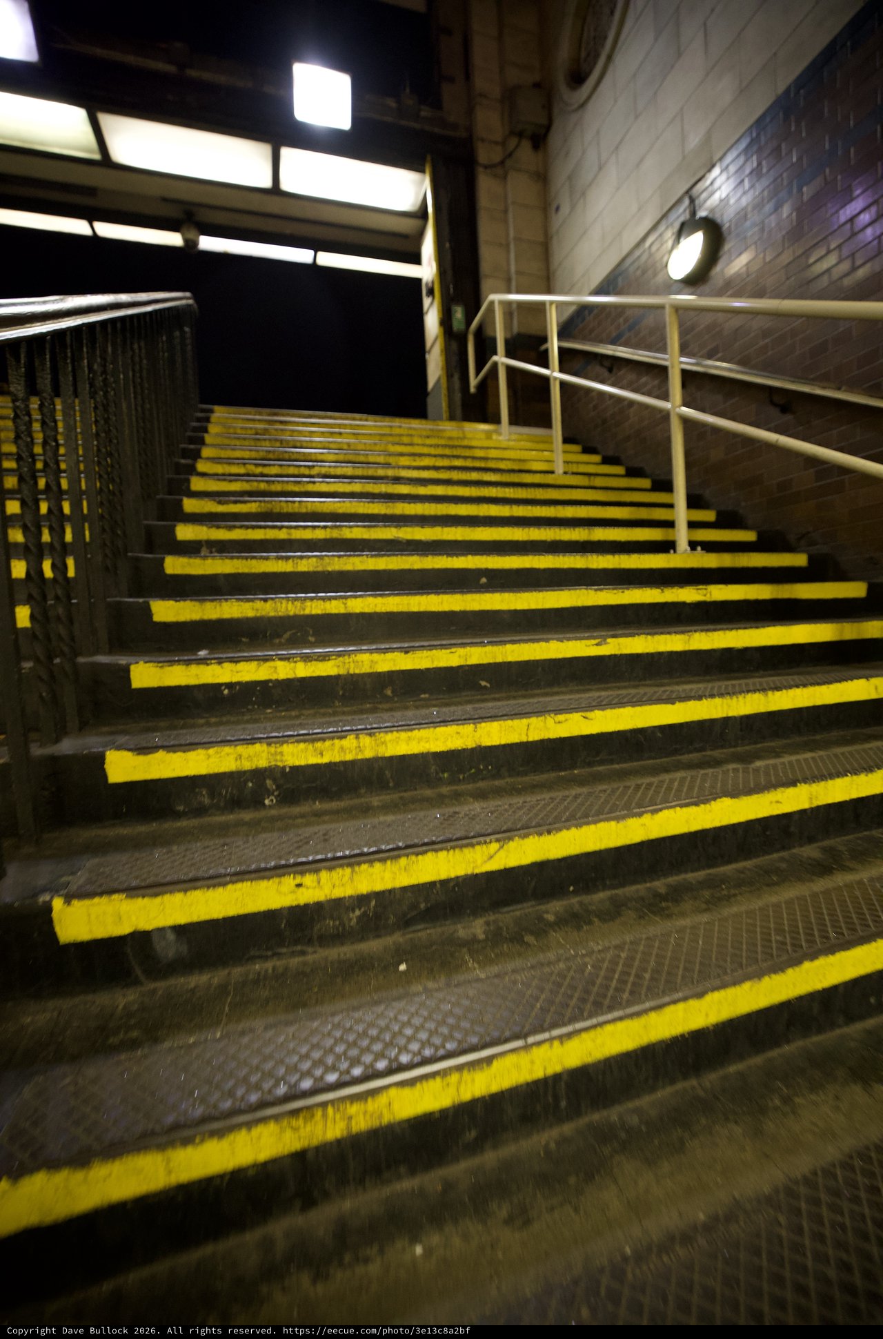 Yellow-Striped Industrial Stairs in London Underground Station